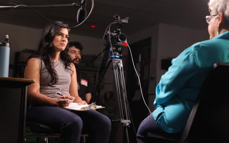 Woman being interviewed